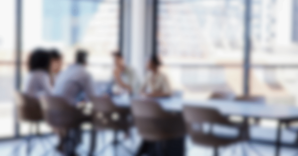 business meeting in room blurred effect