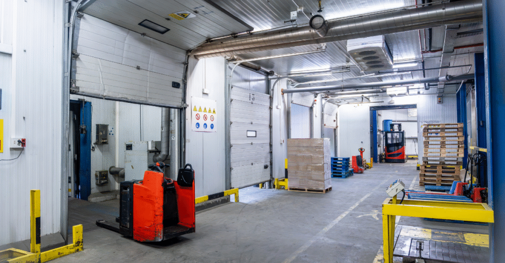 Cold storage logistics operations inside an industrial freezer warehouse