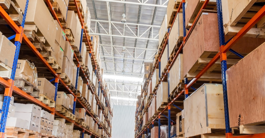Shelves with boxes in factory warehouse