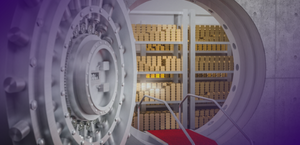 Open vault door revealing shelves of gold bars inside secure storage facility