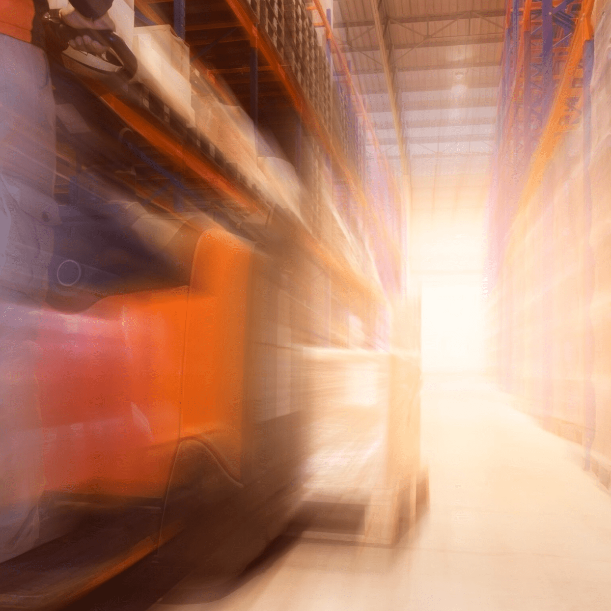 Not all WMS are Created Equal-2 blurred warehouse showing motion